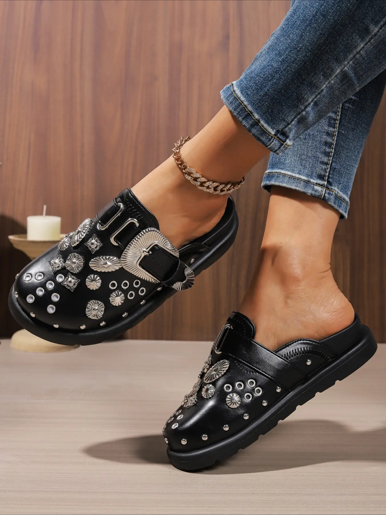Backless mules decorated with metal studs and buckle, flat soft sole slip-on shoes, retro western style footwear for casual daily outfits.