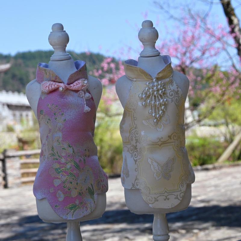 Paws Trendy Pet Spring & Summer Qipao for Dogs & Cats, suitable for Teddy, Bichon Frise and other small dogs. Features embossed fabric with exquisite retro frog buttons, fine workmanship, exuding noble elegance and making your beloved pet stand out.