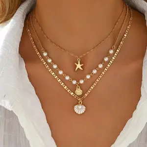 3-Piece Summer Bohemian Pearl Layered Necklace Set, featuring a stackable shell pendant choker-perfect for the beach, travel, everyday wear, accessorizing outfits, dates, parties, and as a holiday gift