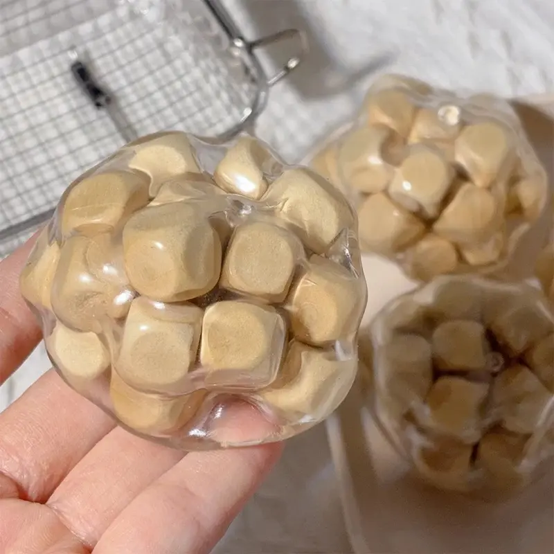 Wooden sound ball squeeze toy, creative stress-relief toy, used to alleviate anxiety and relax the body and mind. A gift for friends, family, or girlfriend