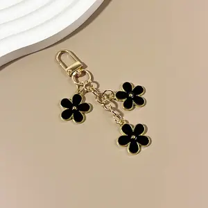 New Arrival INS Style Double-Sided Drip Oil Flower Alloy Keychain - Creative Pendant for Airpods, Bags, or Keys
