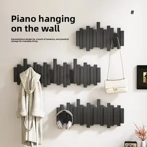 Piano key-shaped wall hook for hanging clothes, no drilling required, for entryway and hallway, creative decorative coat rack with staggered invisible storage