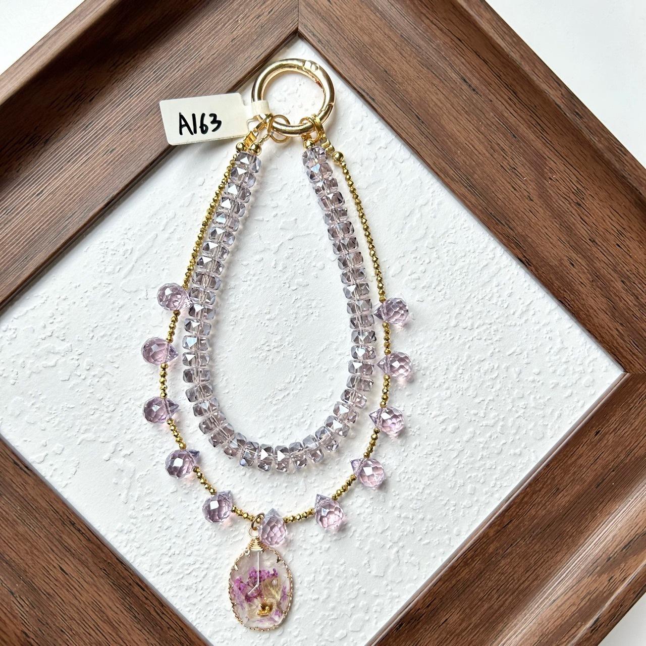 Exquisite handmade purple crystal phone chain, high-end niche wrist accessory, beaded phone case strap, crossbody strap