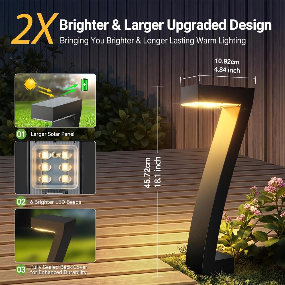 4-pack solar lights for outdoor walkways, upgraded bright LED outdoor solar lights, suitable for outdoor use, IP65 waterproof solar garden lights, suitable for courtyards, driveways, walkways, landscaping, and courtyard decoration.