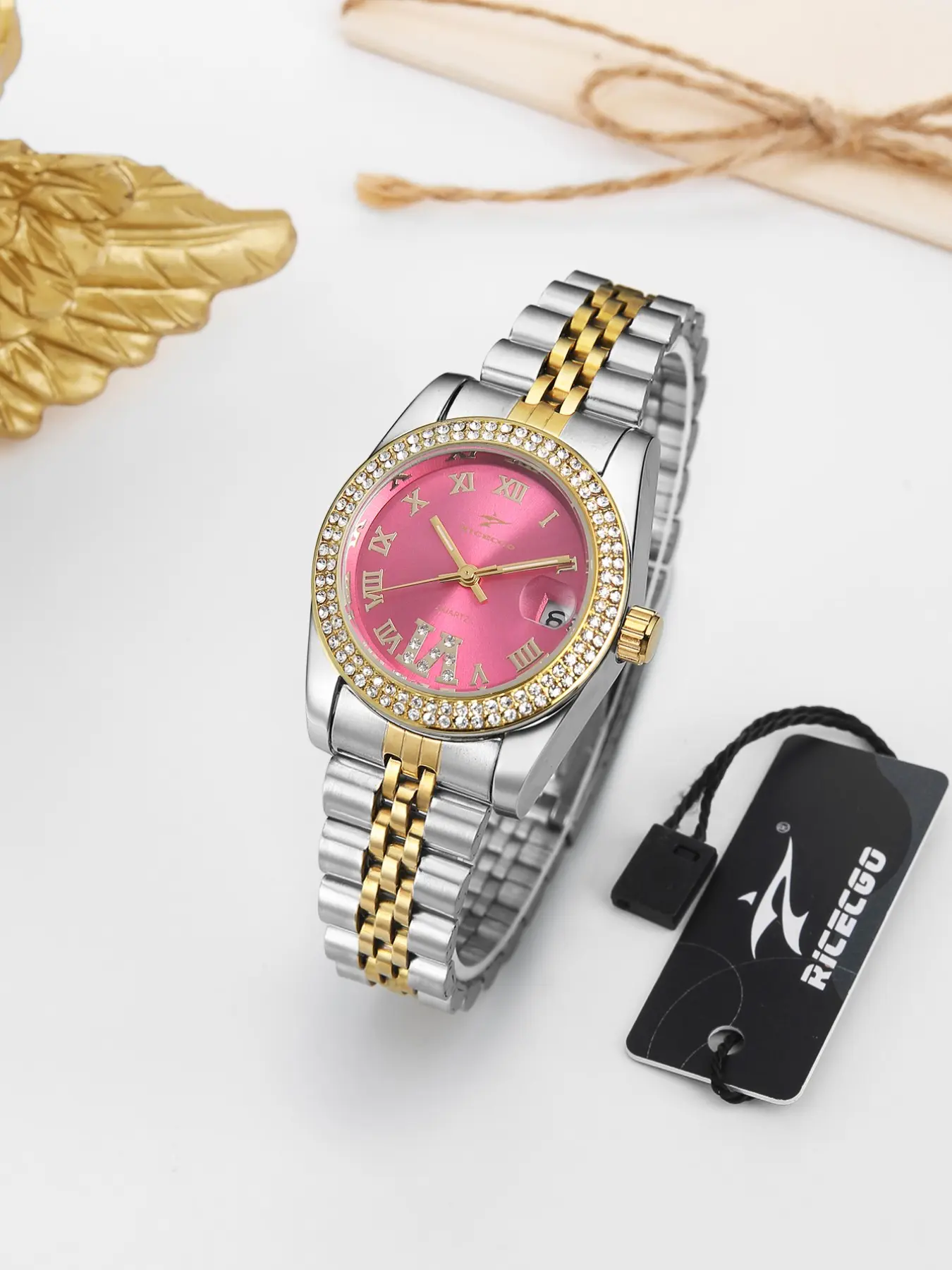 An elegant diamond-set quartz ladies' watch with Roman numeral hour markers and a date display; a stylish yet affordable steel-strap watch perfect for business and daily commuting Analogue Quartz Watch