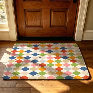 A rectangular indoor colorful checkered polka dot pattern floor mat, with a surrounding border and anti-slip felt and silicone. The soft, machine-washable carpet mat is suitable for use at the entrance to prevent dirt, at the bedroom door, bathroom
