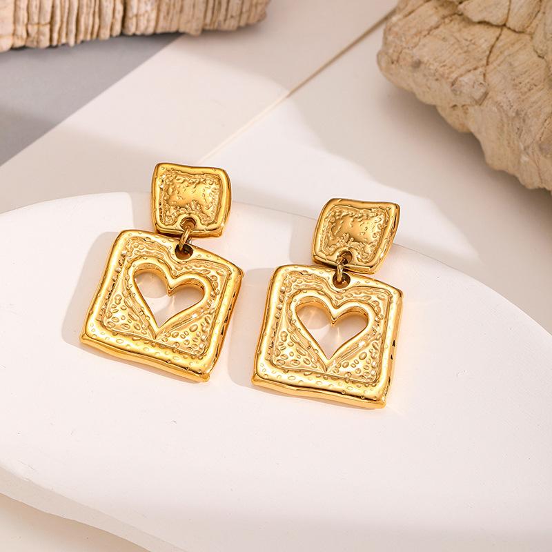 Geometric earrings for women, featuring a heart-shaped original design. These light luxury earrings are made from gold coins and titanium steel, and are suitable for everyday wear without easily fading in color.