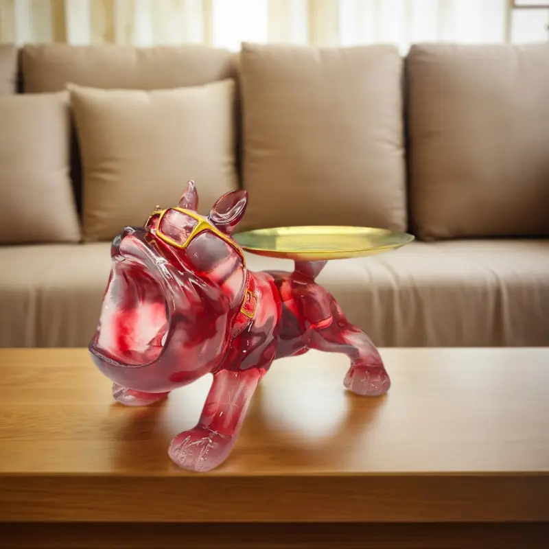 A cute French Bulldog animal figurine ornament with a tray, which can be used for storage and home decoration. It is a multi-purpose sculpture suitable for desktops, offices, living rooms, and bedrooms. It is a collectible figurine and a perfect holiday g