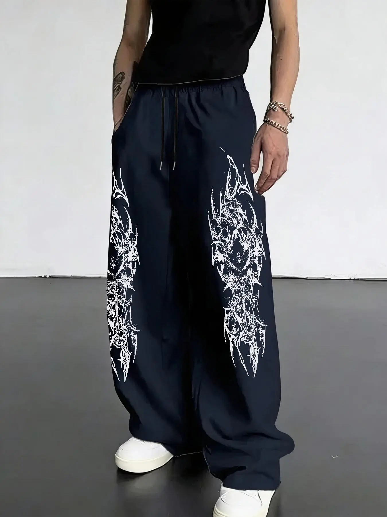 Men's Light Gray Gothic Graphic Sweatpants, Baggy Wide Leg Drawstring Pants with Black Tribal Prints, Elastic Waist, Side Pockets and Relaxed Straight Legs, Retro Y2K Dark Streetwear for Campus, Skate Looks, Travel, Festivals, Parties and Casual Wear