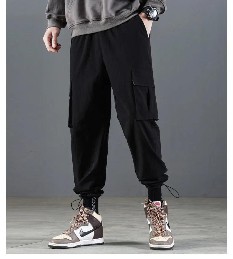 Casual work pants men's spring and autumn Japanese style Hong Kong style straight leg men's pants with multiple pockets, trendy black men's fashion brand ins loose paratrooper casual pants, thick American logging ankle pants