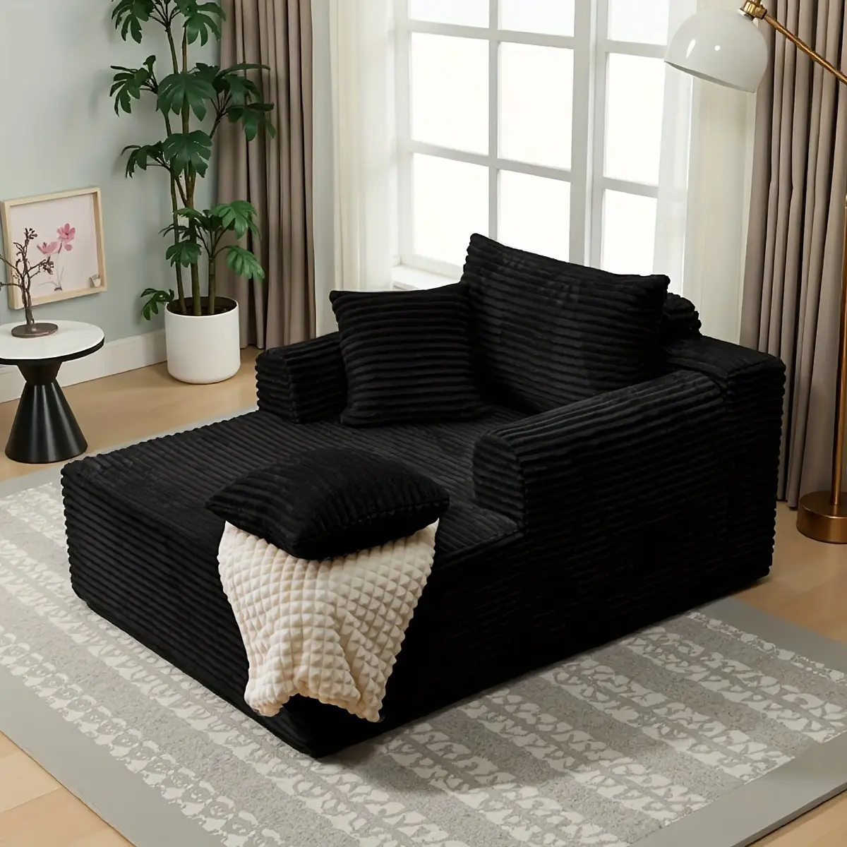 A Modern Fabric Corduroy Sofa Bed with a Deep Seat That Can Be Converted, Featuring Throw Pillows And Cloud-Shaped Armrests, Along with Storage Pockets, Ideal for Use As a Reclining Sofa in Living Rooms, Bedrooms, Apartments, And Offices