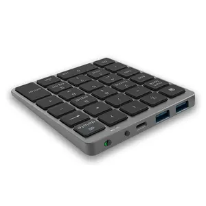 Aluminum Bluetooth wireless numeric keypad with hub function, 28-key portable rechargeable numeric keypad suitable for laptops and desktops.