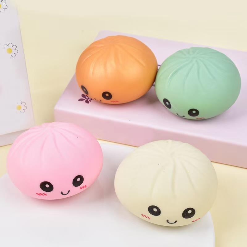 This adorable and soft dumpling toy features a smiling face and is made of supple TPR material, making it a stress-relieving toy.Packaged in a random color blind box, it's the perfect gift for children, Valentine's Day, or Easter. entertainment party