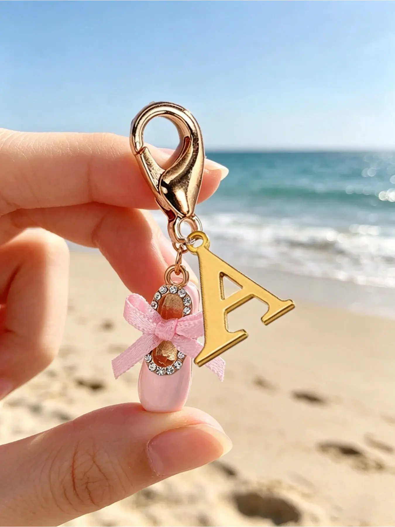 Ballet shoe keychain with pink bow and customizable A-Z letter pendant. Cute ornament for bags, purses and zippers. Perfect dance accessory & gift for girls, women and loved ones on festivals, birthdays, graduation and more.